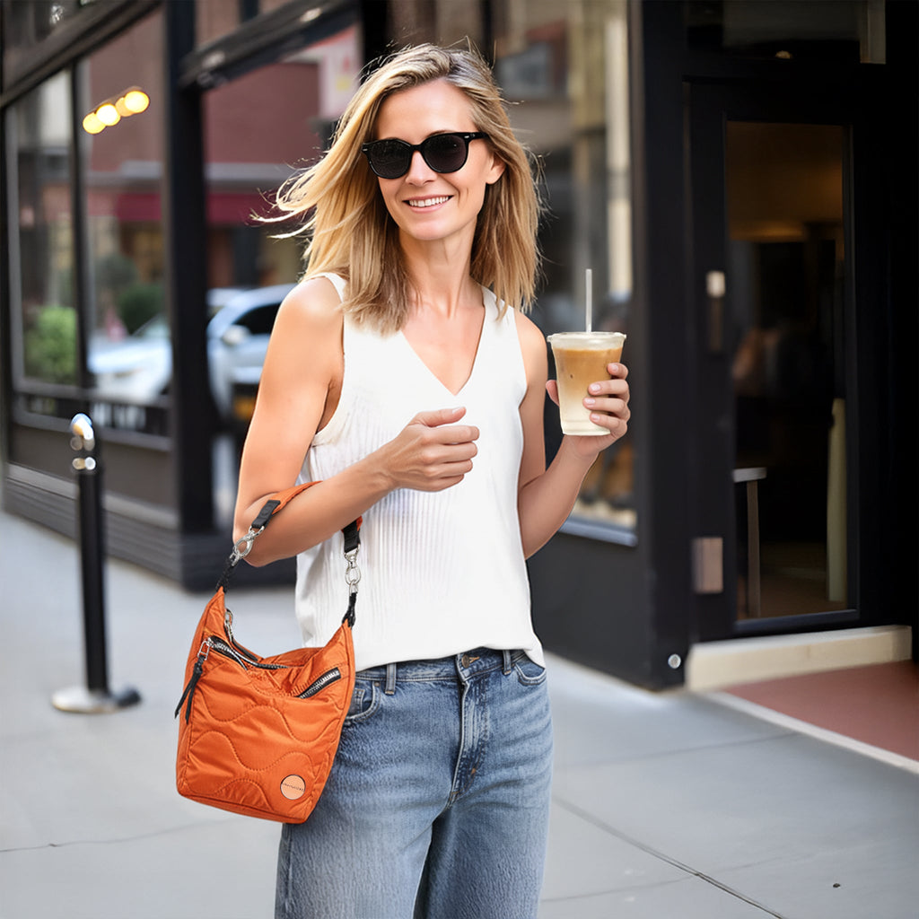 marcel - quilted crossbody bucket bag