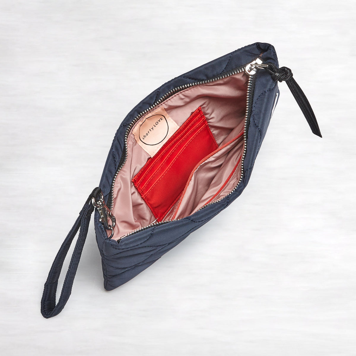 cleo - quilted wristlet clutch