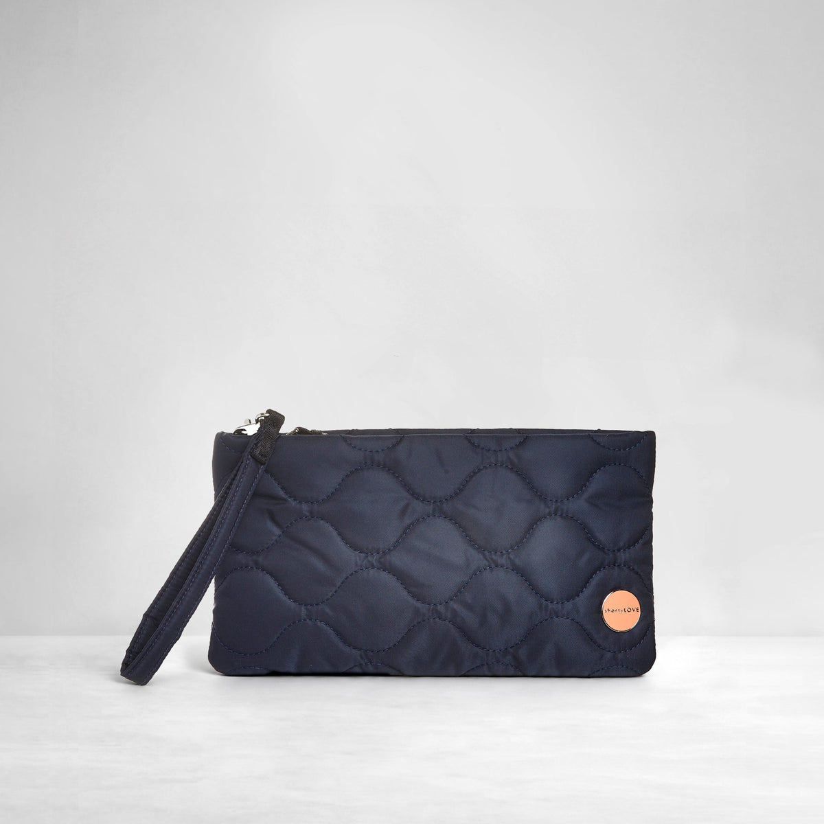 cleo - quilted wristlet clutch