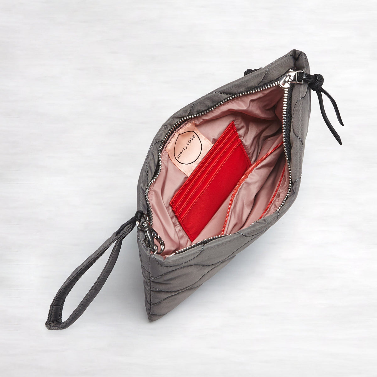 cleo - quilted wristlet clutch