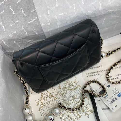 Chanel Pearl logo strap Flap Bag Black